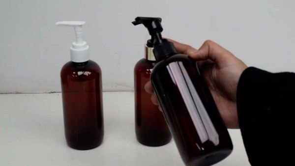 ZMA34 Amber Round Premium Empty Bottle with Golden Black Mist Spray Pump